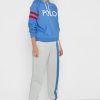 Beigefarbene Jogginghose mit seitlichen Streifen von Ralph Lauren für Damen
