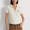 Cremefarbene Poloshirts aus Piqué mit Perlenwappen von Ralph Lauren für Damen