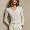 Cremefarbene Ralph Lauren Wollpullover mit langen Ärmeln und V-Ausschnitt für Damen