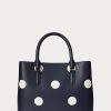 Raffinierte kleine Marcy-Umhängetaschen aus gepunktetem Leder für Damen in Marineblau/Vanille